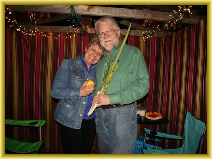 Mary & Steve in the Sukkah with the Lulav 10-09-2012
