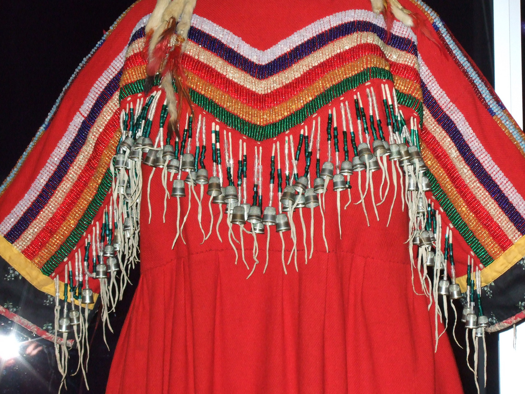 NMAI_Woman's "Indian Cloth" Dress (Thimble Fringe) by Flickr User Lia, CC License = Attribution, Noncommercial, Share Alike