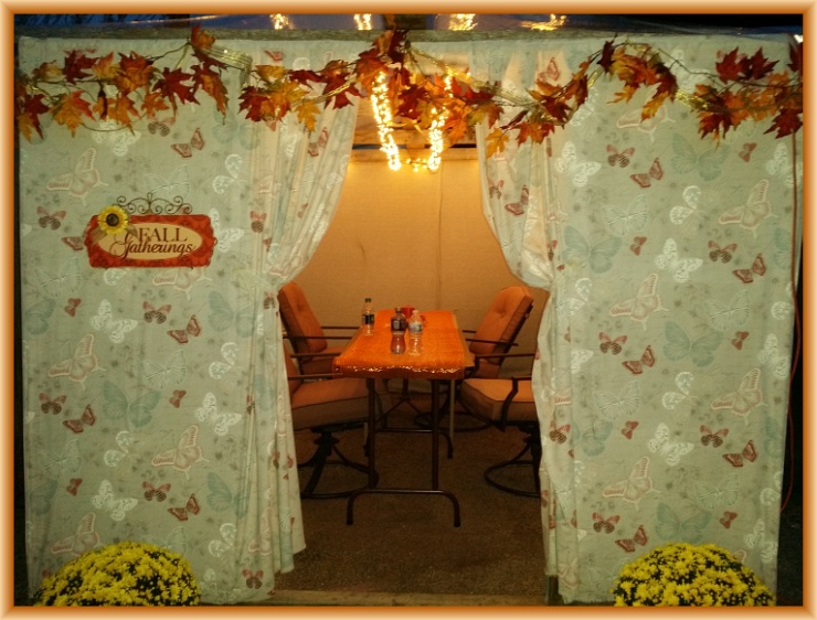 The front of our 2014 Sukkah before all the people gathered in and before food filled the tables. It's a welcoming place for a young couple and their new little baby. Cellphone image by Crystal A Murray. CC License = Attribution, Noncommercial, Share Alike